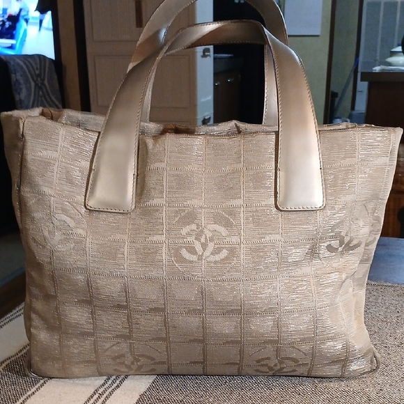 CHANEL Handbags - Authentic Chanel Silver Travel Line Bag